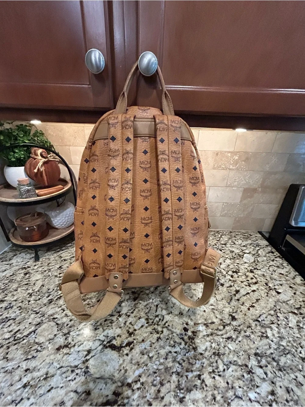 MCM Cognac Visetos Backpack Large with mcm bone bag charm and coa card.